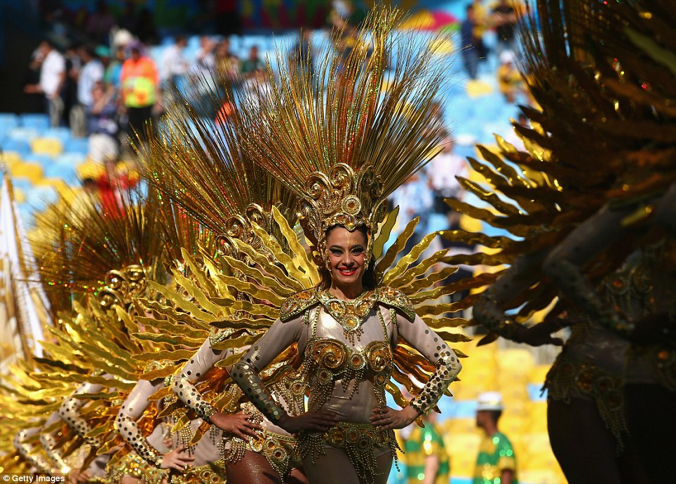 Fans of Ecuador celebrate before the start of the match between Ecuador vs Switzerland, in Brasilia, Brazil, Sunday, June 15, 2014. Ecuador plays in group E of the soccer World Cup. (AP Photo/Eraldo Peres)